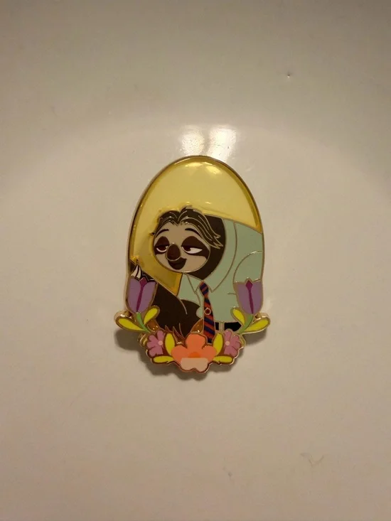 This enamel pin features Flash Slothmore from the Disney animated film Zootopia. - Picture 3 of 8